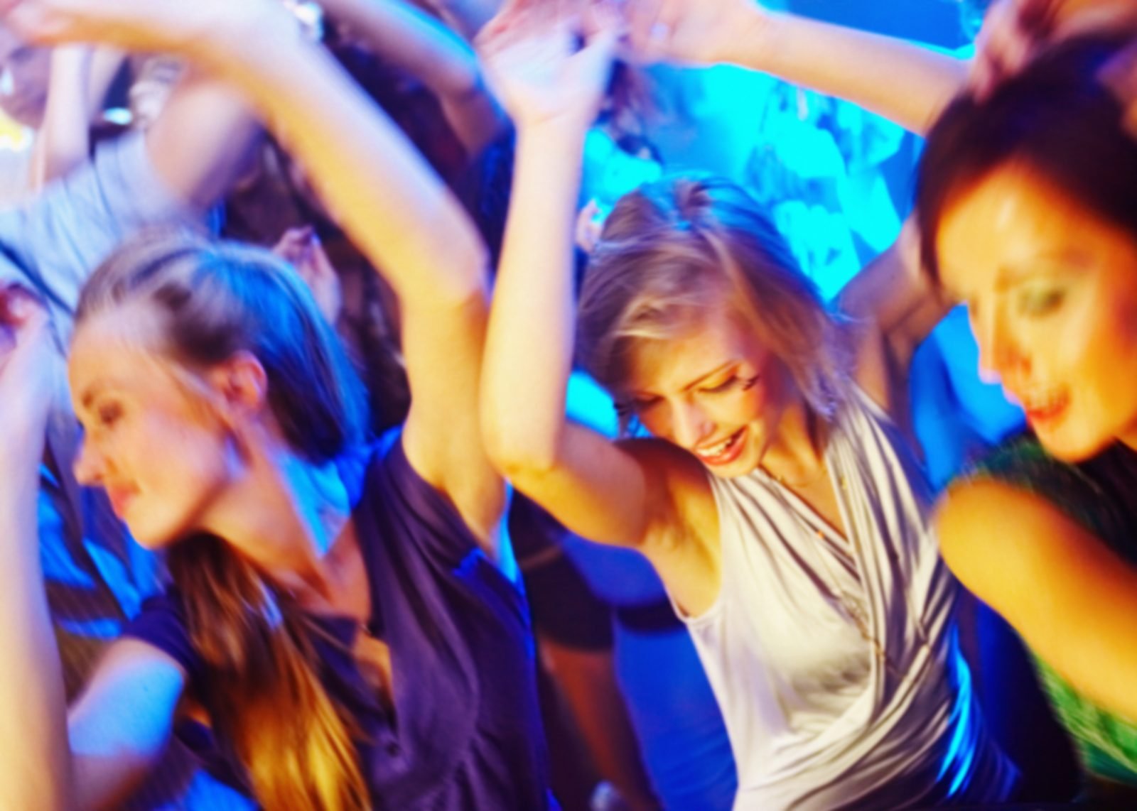 Cabo nightlife with blue and amber lights on the dance floor